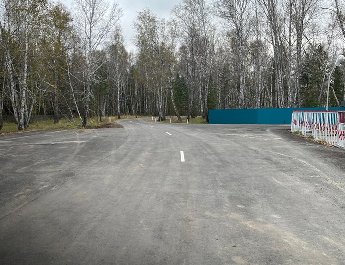 Участок трассы к лагерю «Березовая роща» обновили в Омской области